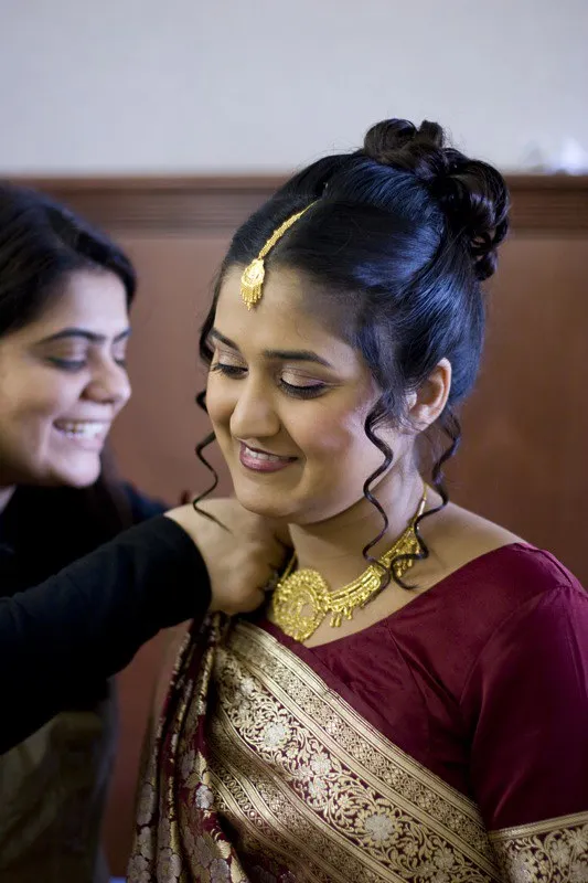 Bridal hair styling and makeup preparation at salon